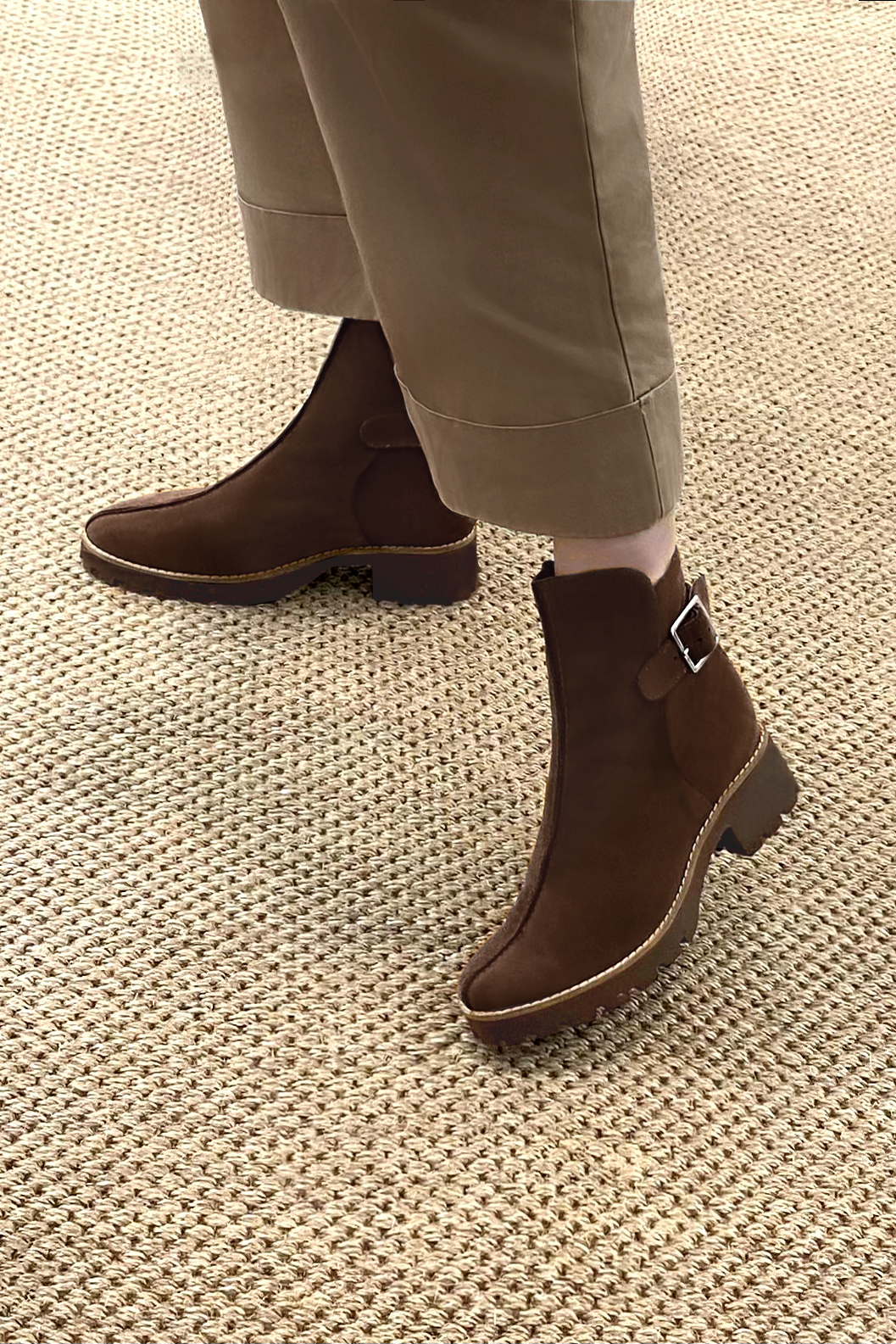 Dark brown women's ankle boots with buckles at the back. Round toe. Low rubber soles. Worn view - Florence KOOIJMAN